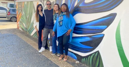 Graffiti leva natureza aos muros de escola no bairro Botafogo 